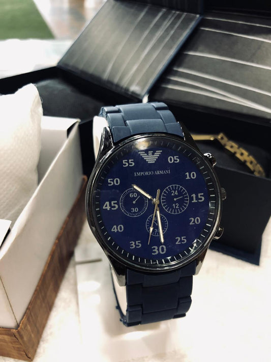 Blue Emporio Armani watch with a detailed face on a white surface